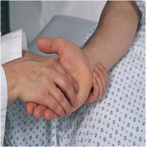 An examiner's fingers pressing deep into the little-finger side of a patient's partly flexed wrist.